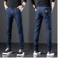 Spring wear new jeans casual Korean small feet elastic tether trendy men's slim long pants