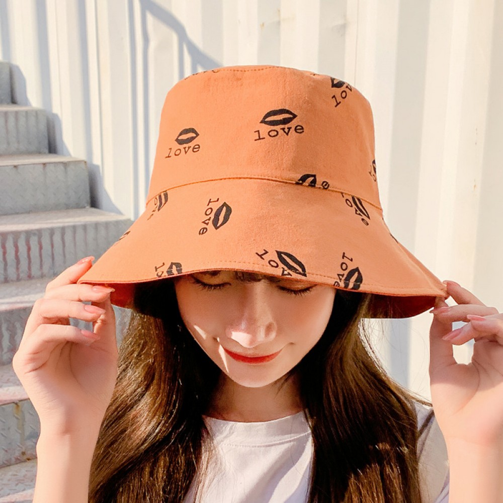 Tide female hat spring and summer new outdoor sunshade hat printed letters fisherman hat lips double-sided cloth hat
