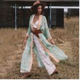 Spring and summer new bohemian beach holiday style printed sunscreen cardigan shawl outside
