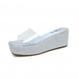 Wedge slippers female summer new fashion thick bottom penetrating bright film high heel half drag sandals
