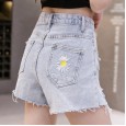 Summer new women's chic loose loose thin daisy embroidery hole denim shorts female hot pants