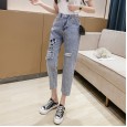 Summer new cartoon embroidered thin jeans women loose and versatile age-reduced holes nine points harem pants tide