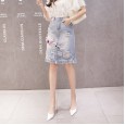 Broken denim mid-length skirt female spring new beaded embroidery tassel high waist a word was thin package hip skirt